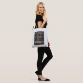 Moed duwt kracht tote bag (Op model)