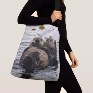 Moeder en jong zeeotters crossbody tas
