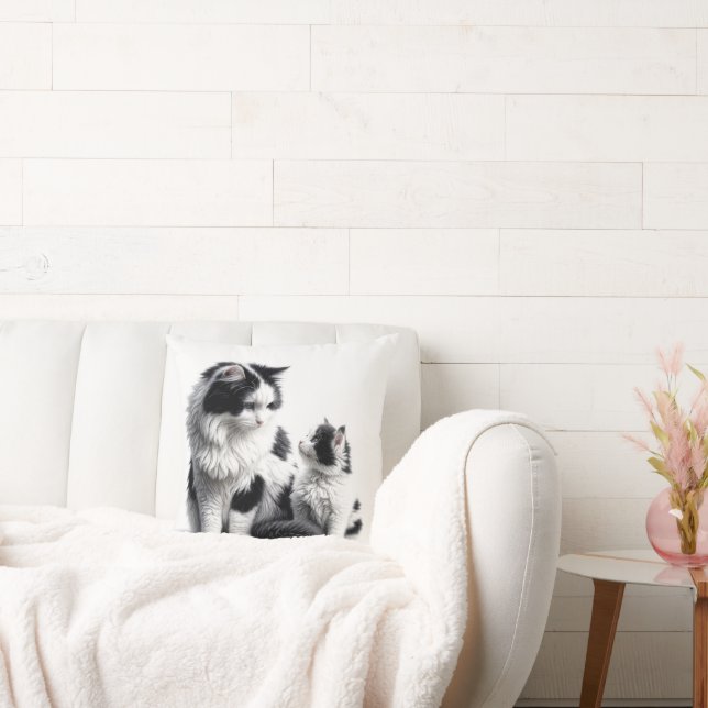 Moeder kat met kitten op wit kussen (Bank)