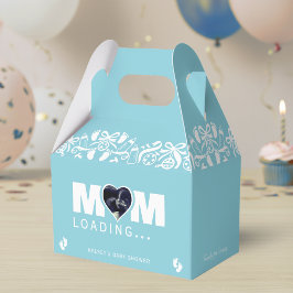 Moeder laadt foto echografie blauwe baby shower bedankdoosjes