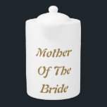 Moeder van de bruid Mam Goud Wit Cadeau Favoriet Theepot<br><div class="desc">'Moeder van de bruid',  in mooie en elegante tekst,  is dit een perfect cadeau of partijvoordeel voor de moeder van de bruid. U kunt zich aanpassen door de tekst naar wens te wijzigen.</div>