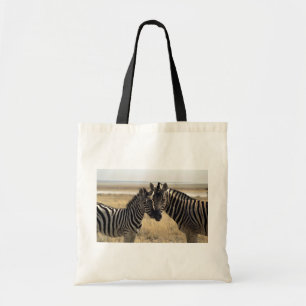 Moeder zebra en jonge zebra tote bag