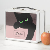 Moeie glurende zwarte kat op paars (In situ)