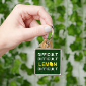 "Moeilijk, moeilijk, lemon, moeilijk" Sleutelhanger (Hand)