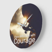 Moeilijkheden onder ogen zien met moed en succes z grote klok (Hoek)