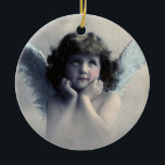Mogen de engelen over je waken keramisch ornament<br><div class="desc">Een troostende zegen op de rug luidt: moge de engelen over je waken. Prachtig  ontwerp van een lieve engel met zachte witte vleugels en rozige wangen,  met haar gezicht in haar handen. Ziet er vredig en vriendelijk uit. De achtergrond is gevuld met zachte etherische wolken.</div>