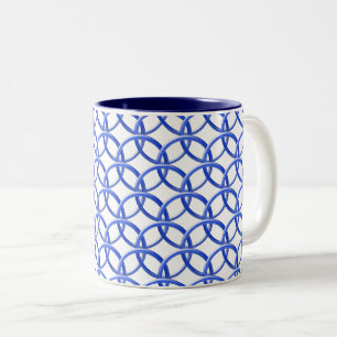 Mok - Blauwe ringen met elkaar verbinden