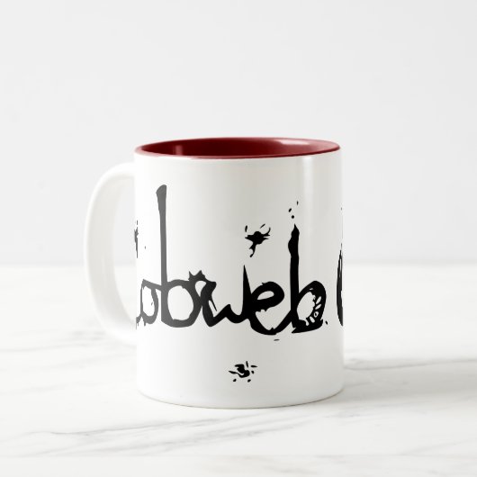 Mok: Cobweb Games Tweekleurige Koffiemok (Voorkant links)