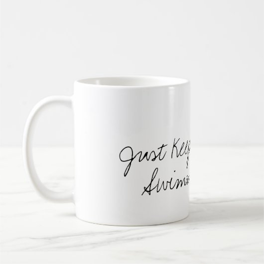 mok Goldfish Coffee "Gewoon door te zwemmen" (Links)