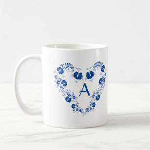 Mok met monogram en het blauw hart symbool