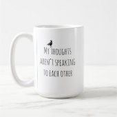 Mok met twee merels zitten op een capibara (Links)