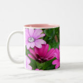 Mok van Cranesbill Geranium (roze bloemen) (Links)