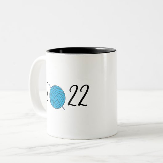 mok van garen van 2022 (Voorkant links)