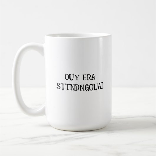 Mok van gekramde letters met poolman (Links)