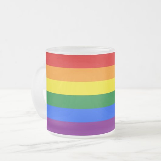 Mok van klein glas, bevroren, met gekleurde vlag v (Voorkant links)