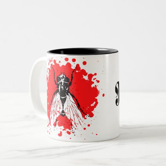 Mok van koffie voor het ontwerpen van renvelvliege (Voorkant links)