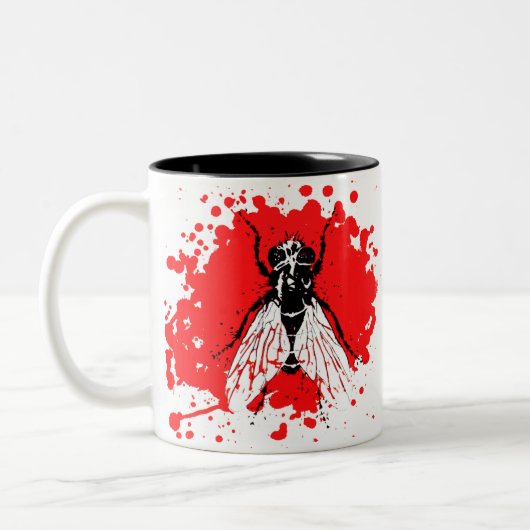 Mok van koffie voor het ontwerpen van renvelvliege (Links)