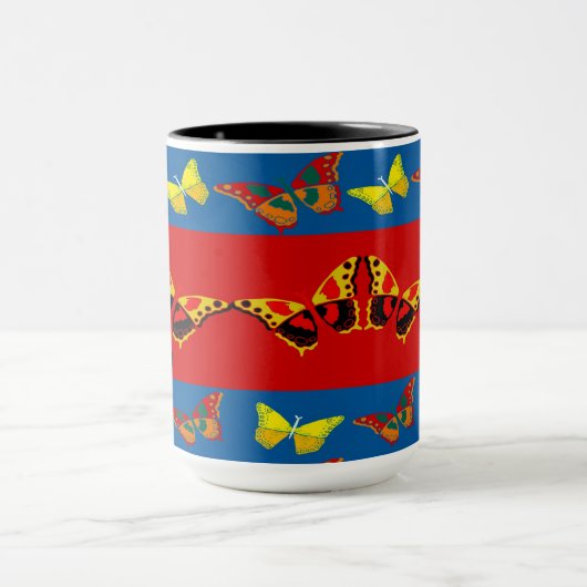 Mok vlinder in blauw, geel en rood (Midden)