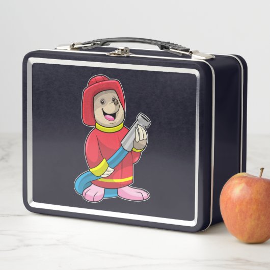 Mole als brandweerman met slang (In situ)