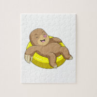Mole tijdens het zwemmen met Lifebuoy