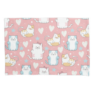 mollige katten in pastelblauw, wit en roze kussensloop