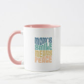 Mom’s Smile Means Peace – Green & Orange Mug Mok (Links)