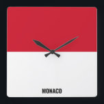 Monaco Flag Dazzling Patriotic Vierkante Klok<br><div class="desc">Monaco Flag Dazzling Patriottische Vierkante Wandklok in de kleuren en de elementen van de nationale vlag van Monaco die de voorkant van de klok bedekken. Nationale vlagkleuren worden aangevuld met de tekst "Monaco" onderaan. Tekst kan volledig worden aangepast met de functie "Customize it!". Wijzig het gerust, verwijder het of voeg...</div>