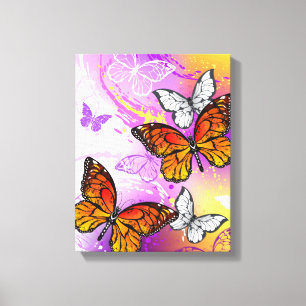 Monarch Butterflies op Paarse achtergrond Canvas Afdruk