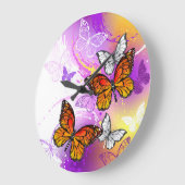 Monarch Butterflies op Paarse achtergrond Grote Klok (Hoek)