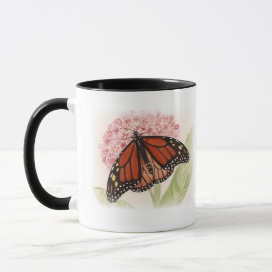 Monarch Butterfly en Mok van de derde pijler (Links)