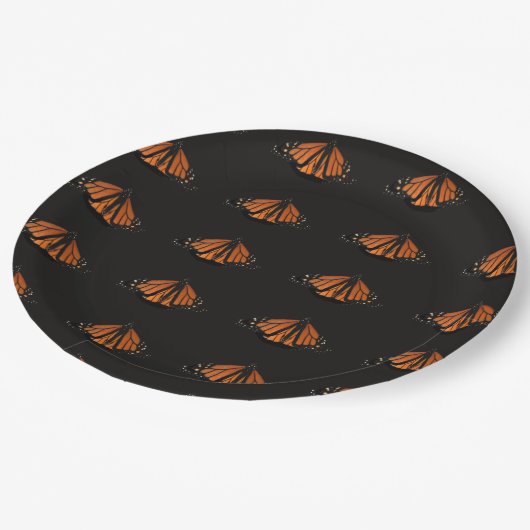 Monarch Butterfly in de sleutel van het Sinaasappe Papieren Bordje (Gekanteld)