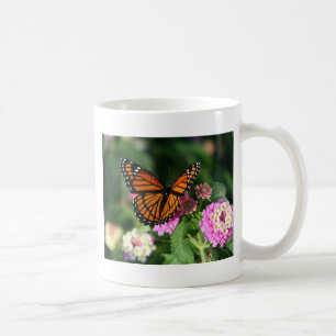 Monarch Butterfly op Lantana Flower Koffiemok
