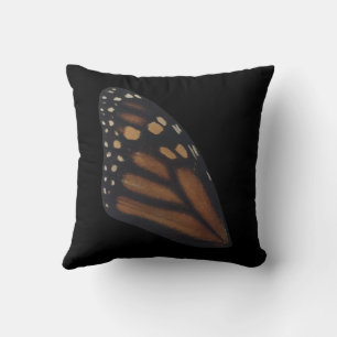 Monarch Butterfly wing on Black Kussen
