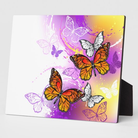 Monarchvlinders op paarse achtergrond fotoplaat (Zijkant)