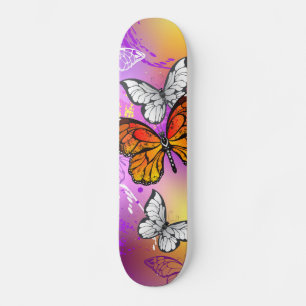 Monarchvlinders op paarse achtergrond persoonlijk skateboard
