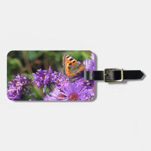 Monboogvlinder en paarse bloemen bagagelabel