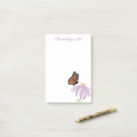 Monboogvlinder met Paarse-kanonventilator Post-it® Notes (Op bureau)