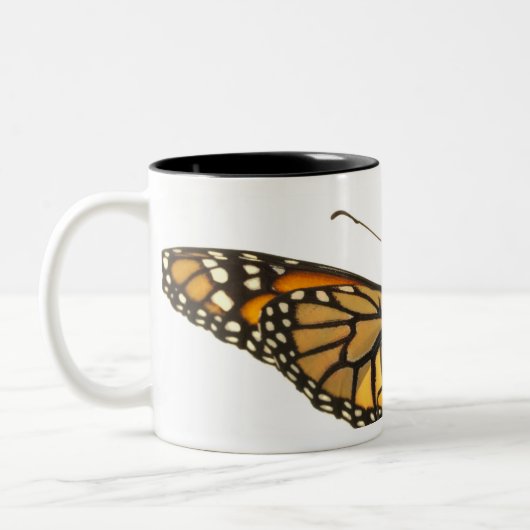 Monboogvlinder met vleugels uitgespreid tweekleurige koffiemok (Links)