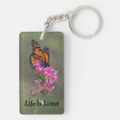 Monboogvlinder op een roze ventiel sleutelhanger (achterkant)