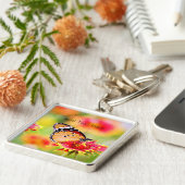 Monboogvlinder op rode en gele bloem sleutelhanger (Zijkant)