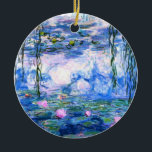 Monet Roze watergelilies Keramisch Ornament<br><div class="desc">Een monetroze waterlelingenornament met prachtige roze waterlelies die zweven in een kalme blauwe vijver met lendenpootjes. Een geweldige cadeau van Monet voor fans van het impressionisme en de Franse kunst. Serene natuur impressionisme met mooie bloemen en schilderachtig vijver landschap.</div>