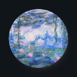 Monet Roze watergelilies Papieren Bordje<br><div class="desc">Monet roze waterlelies 7-inch papieren borden met prachtige roze waterlelies die zweven in een kalm blauw vijver met lly pads. Een geweldige cadeau van Monet voor fans van het impressionisme en de Franse kunst. Serene natuur impressionisme met mooie bloemen en schilderachtig vijver landschap.</div>