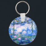 Monet Roze watergelilies Sleutelhanger<br><div class="desc">Een Monet roze sleutelhanger met een knop voor het doen van een glazen fluitje met mooie roze waterlelies die zweven in een kalme blauwe vijver met een lendenpootje. Een geweldige cadeau van Monet voor fans van het impressionisme en de Franse kunst. Serene natuur impressionisme met mooie bloemen en schilderachtig vijver...</div>