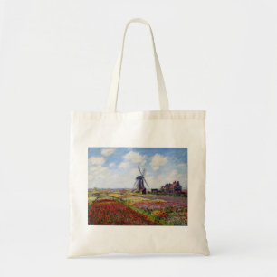 Monet terrein van tulpen met Canvas tas van de win