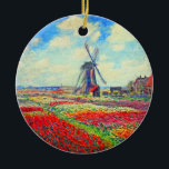 Monet Tulips Windmill Keramisch Ornament<br><div class="desc">Keramisch siermateriaal met de bloem van Claude Monet en het schilderij van de windmolen. Mooie en kleurrijke velden van rode,  roze en gele tulpen naast een windmolen en huis in Nederland. Een geweldige cadeau van Monet voor supporters van indrukwekkende tonen en Franse kunst.</div>