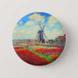 Monet Tulips Windmill Ronde Button 5,7 Cm<br><div class="desc">Button met de bloem van Claude Monet en het schilderij van de windmolen. Mooie en kleurrijke velden van rode,  roze en gele tulpen naast een windmolen en huis in Nederland. Een geweldige cadeau van Monet voor supporters van indrukwekkende tonen en Franse kunst.</div>