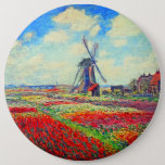 Monet Tulips Windmill Ronde Button 6,0 Cm<br><div class="desc">Button met de bloem van Claude Monet en het schilderij van de windmolen. Mooie en kleurrijke velden van rode,  roze en gele tulpen naast een windmolen en huis in Nederland. Een geweldige cadeau van Monet voor supporters van indrukwekkende tonen en Franse kunst.</div>