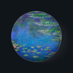 Monet Water Lilies 1906 Ronde Button 5,7 Cm<br><div class="desc">Button met het olieverschilderij van Claude Monet Water Lilies (1906). Een serene nog leven van de interactie tussen licht en reflectie op mooie waterlib in een vijver. Een groot geschenk voor fans van het impressionisme en de Franse kunst.</div>