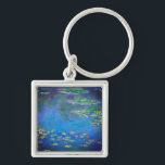 Monet Water Lilies 1906 Sleutelhanger<br><div class="desc">Sleutelhanger met het olieverschilderij van Claude Monet Water Lilies (1906). Een serene nog leven van de interactie tussen licht en reflectie op mooie waterlib in een vijver. Een groot geschenk voor fans van het impressionisme en de Franse kunst.</div>