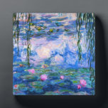 Monet Waterlelies Plaque Fotoplaat<br><div class="desc">Monet Waterlelies-plaat. Olieverfschilderij op canvas uit 1916. Monet schilderde obsessief zijn beroemde waterleliesvijver tijdens de laatste jaren van zijn carrière, waarbij hij inspiratie putte uit het licht van de zon en het veranderende effect ervan op het water en de water- en bloemen en het gebladerte. Dit schilderij toont een levendig...</div>